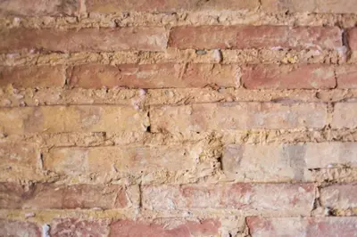 an old brick wall with at Precioso atico en pleno centro de Valencia in Valencia