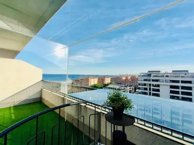 a balcony with a view of the ocean at NON STRESS Ático Dúplex con vistas al MAR in Valencia