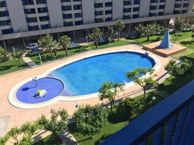 an overhead view of a swimming pool in a building at ApartUP Patacona Essence in Valencia