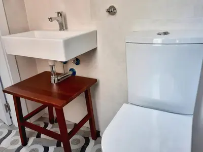 a bathroom with a sink and a toilet at Hotel 19-30 Valencia in Valencia