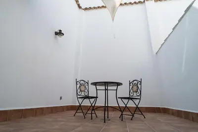 a table and two chairs in a room at Star Anna in Anna