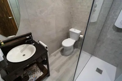 a bathroom with a toilet and a sink and a shower at Bellanna - Panorámica in Anna