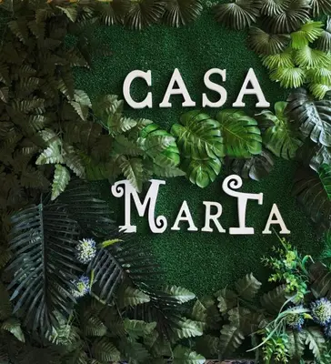 a sign that says casa maria with plants at Casa MarTa in Chella