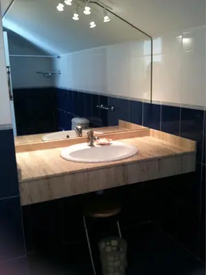 a bathroom with a sink and a mirror at Ideal house at the Beach in Sagunto(Valencia) in Sagunto