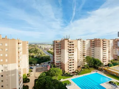 a wooden life guard station on the beach at Global Vacacional, Apartamento con buenas vistas en Canet playa in Canet de Berenguer