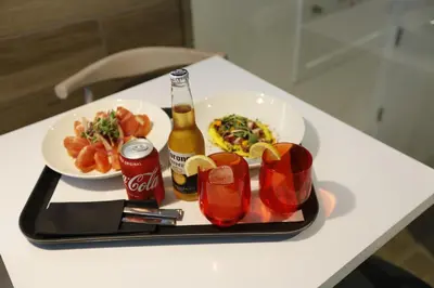 a tray of food and drinks on a table at Hotel Loob Valencia in Mislata