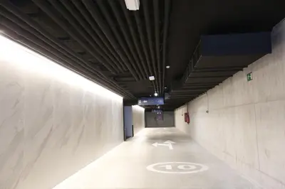a long hallway with a no parking sign on the floor at Hotel Loob Valencia in Mislata
