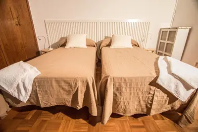 two beds sitting next to each other in a room at Rotaret in Valencia