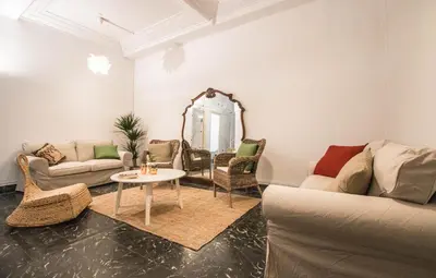 a living room with a couch and a table at Rotaret in Valencia