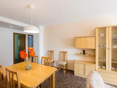 a kitchen and dining room with a table and chairs at Apartment Ana by Interhome in Cullera
