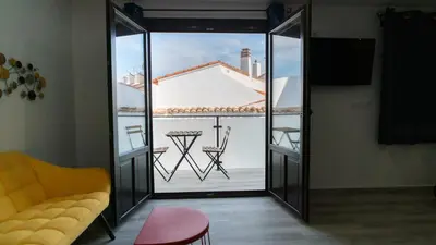 a room with a view of a balcony at ROMANTICA in Anna