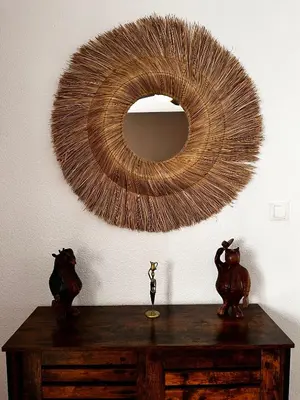 a mirror on top of a wooden table with a table at Don Quijote CABANAL in Cullera