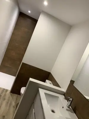 a bathroom with a white sink in a room at Don Quijote CABANAL in Cullera