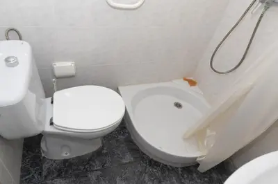 a bathroom with a white toilet and a sink at El Raco, B-8-15 in Cullera
