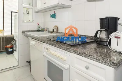 a kitchen with a sink and a counter top at Florazar-3, 14-E in Cullera