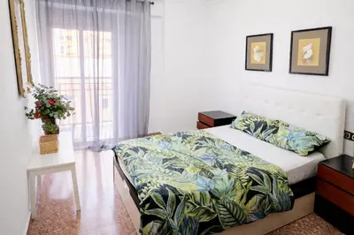a bedroom with a bed and a window at Habitacion privada Valencia in Valencia