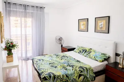 a bedroom with a bed and a window at Habitacion privada Valencia in Valencia