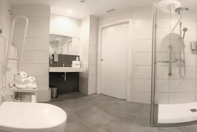 a bathroom with a shower and a toilet and a sink at PLAZA VIEW in Valencia