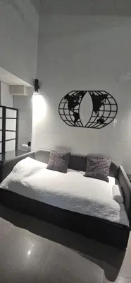 a bedroom with a large bed in a room at A6 ViviendaTuristicaValencia Ciencias in Valencia