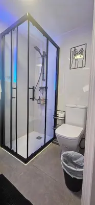 a bathroom with a shower and a toilet at A6 ViviendaTuristicaValencia Ciencias in Valencia