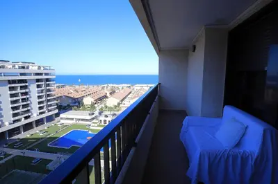 a balcony of a hotel with a view of the ocean at ÁTICO PATACONA BEACH PLAYA in Valencia