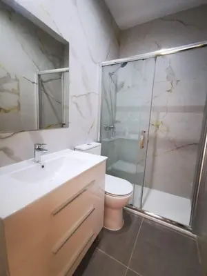 a bathroom with a shower and a sink and a toilet at UIM Mediterraneo Segorbe 1 Wifi in Puerto de Sagunto
