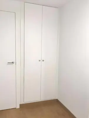 a white closet with white cabinets in a room at Estudio en el Corazón de Valencia al lado Catedral in Valencia