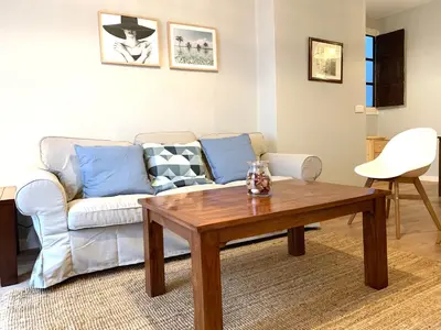 a living room with a couch and a coffee table at 2 Apartamento TERRAZA Free Wifi in Valencia