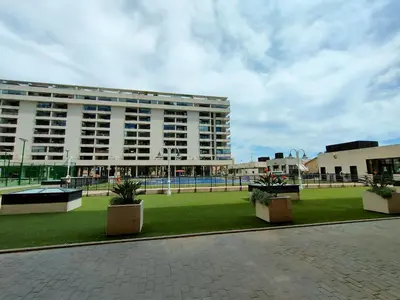 a large building with a park in front of it at NON STRESS First Level in Valencia