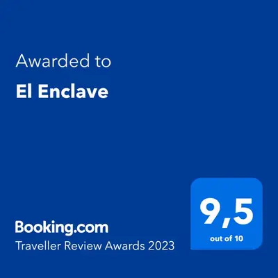 a blue screen with the text awarded to el enbridge at El Enclave in Chulilla