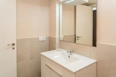 a bathroom with a sink and a mirror at MD Galán Street in Valencia