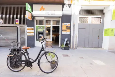 a bike parked in front of a building at FLORIT FLATS - The Soho in Ruzafa in Valencia