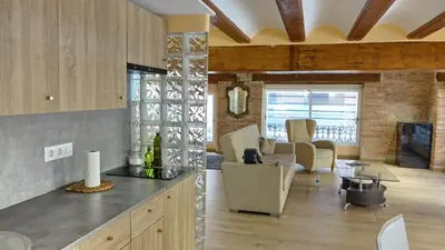 a kitchen and living room with a table and chairs at Lepanto Centro Valencia1 in Valencia