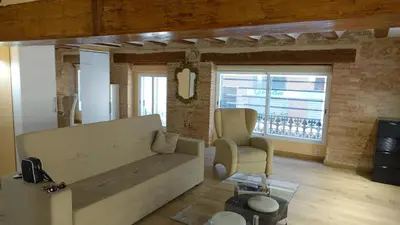 a living room with a couch and a chair at Lepanto Centro Valencia1 in Valencia