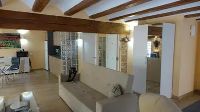 a living room with a large mirror on the wall at Lepanto Centro Valencia1 in Valencia
