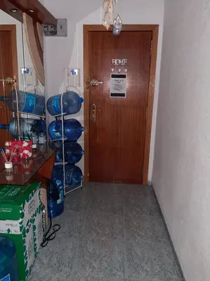 a room with a door and a room with a room at habitación grande en piso compartido con 2 adultos in Valencia