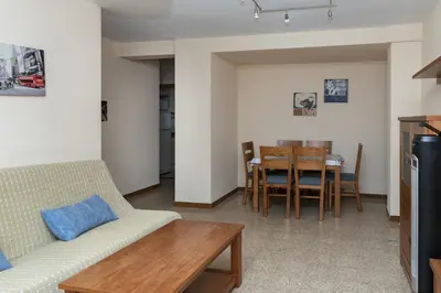 a living room with a couch and a table at Solimar, 5-24 in Cullera