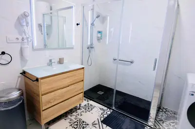 a bathroom with a shower and a sink at Arenas beach 2 in Valencia