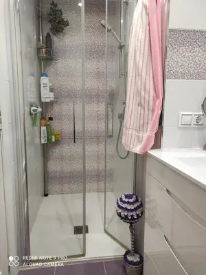 a shower with a glass door in a bathroom at Comoda y moderna HABITACION DOBLE in Valencia