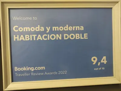 a sign for a melbourne hilton addiction device at Comoda y moderna HABITACION DOBLE in Valencia