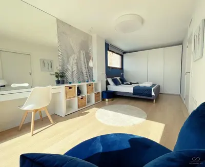 a living room with a bed and a couch at Colina del Sol Cullera - Villa Sol in Cullera