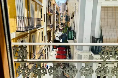 a view of a city street from a balcony at Acogedor apartamento centro histórico Valencia in Valencia