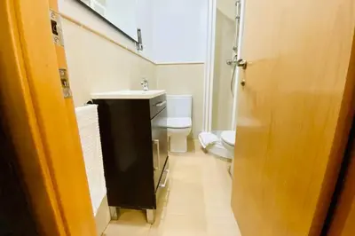 a bathroom with a sink and a toilet at Acogedor loft en centro histórico in Valencia