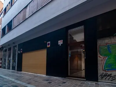 a building with a door on the side of it at MD Vitoria City Center in Valencia