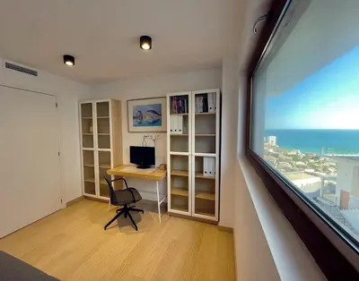 a room with a desk and a window with a computer at Colina del Sol Cullera - Villa Luna in Cullera