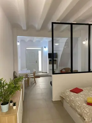 a large room with a bed and a dining room at Loft Cabanyal in Valencia