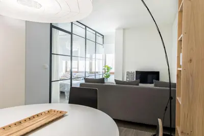 a living room with a couch and a table at Loft en el corazón de Valencia in Valencia