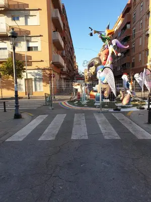 a street with a fountain in the middle of a city at Apartamento equipado playa Valencia OnesDeMar in Valencia