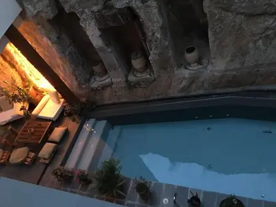 an overhead view of a swimming pool in a building at CASA PORTALICO in Jérica