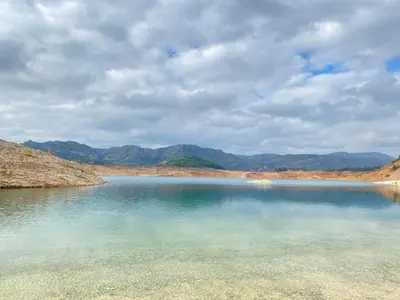 a large body of water with mountains in the background at Casa Mayor in Tous